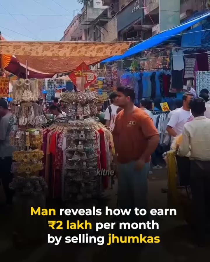 This is our repost. It shows the same moment cropped to 4:5, with a bold caption bar across the bottom that reads: Man reveals how to earn ₹2 lakh per month by selling jhumkas.
